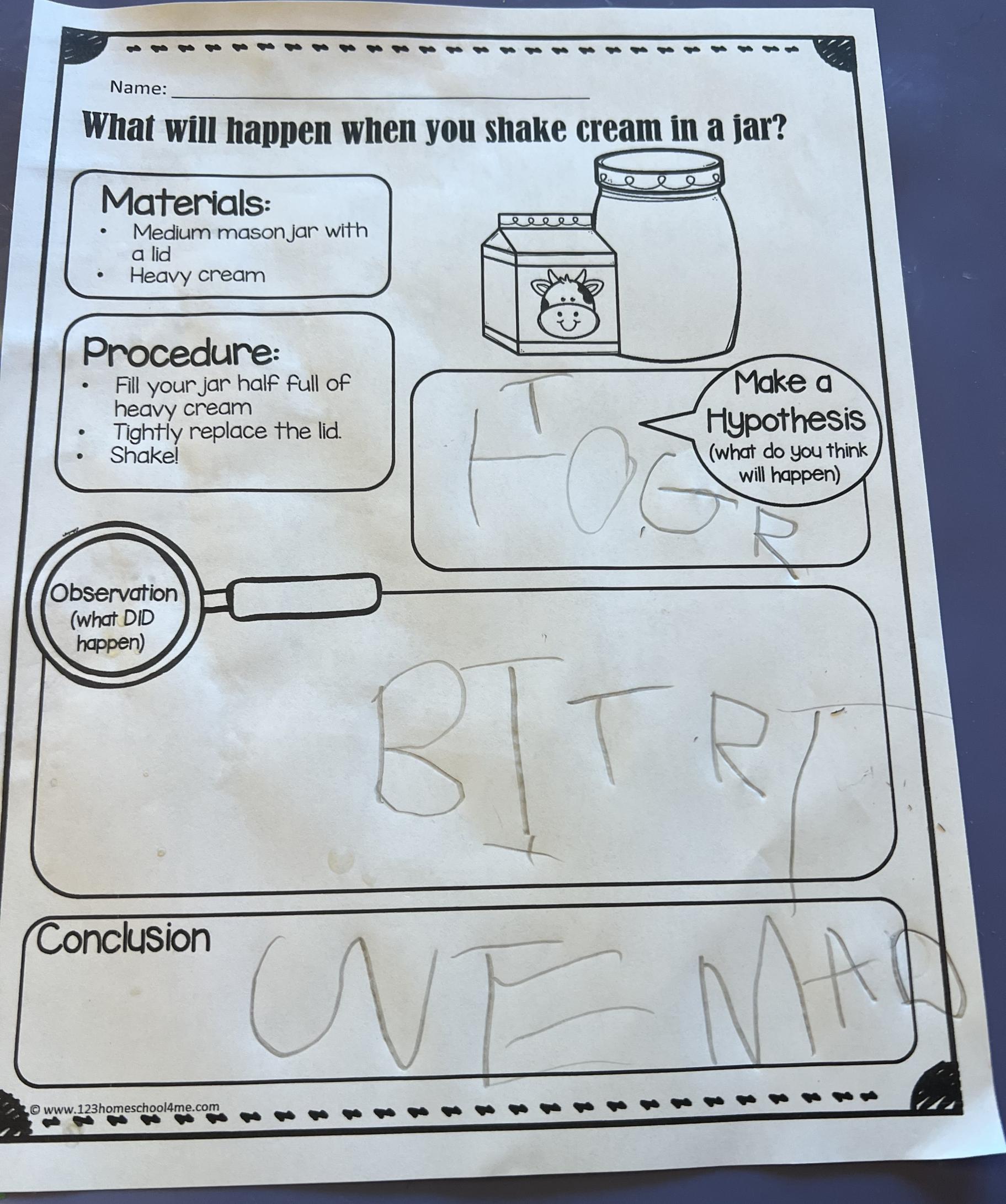 a photo of a young child's worksheet about shaking cream in a jar to make butter